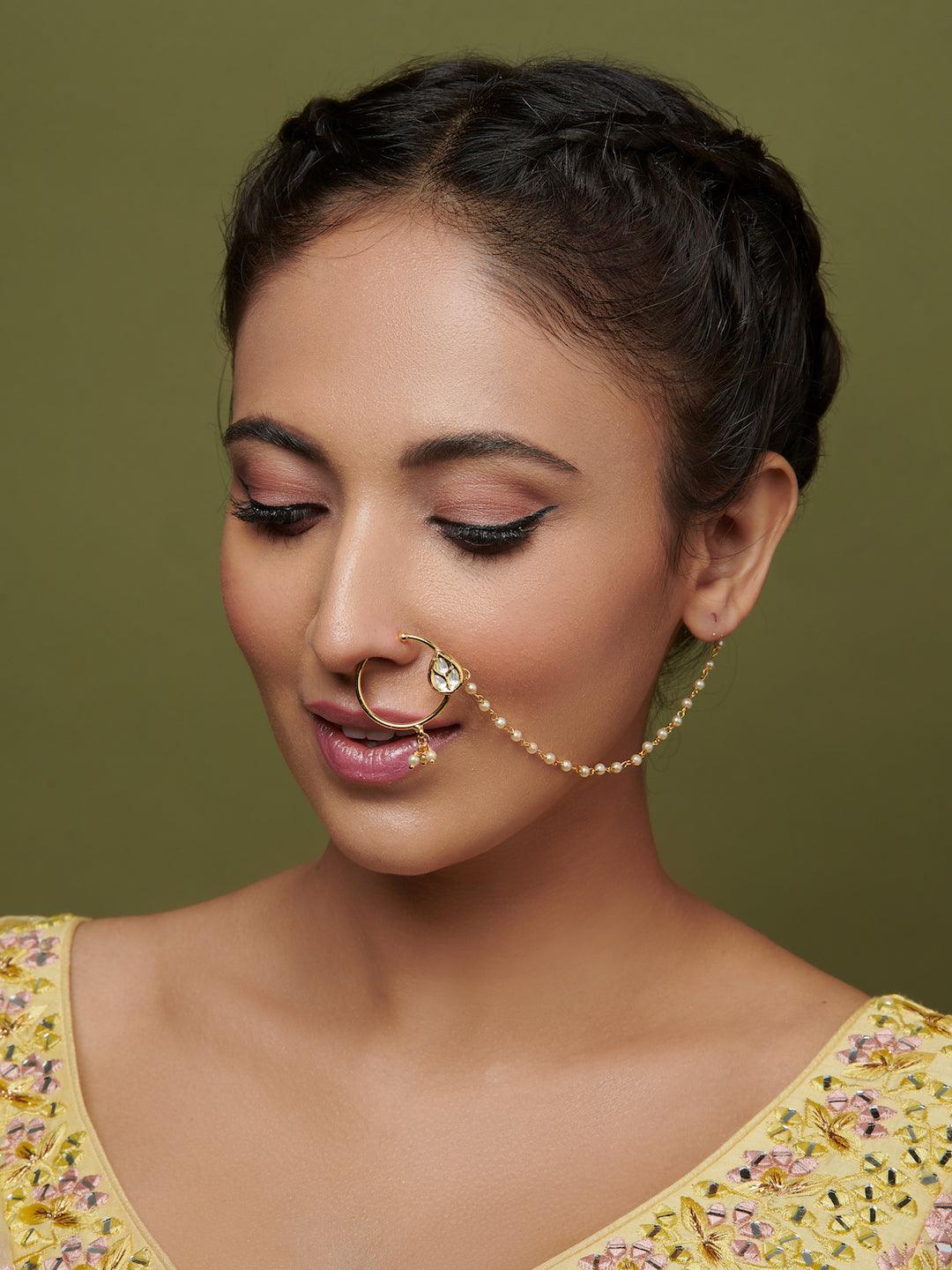 Bridal nath designs in gold sales