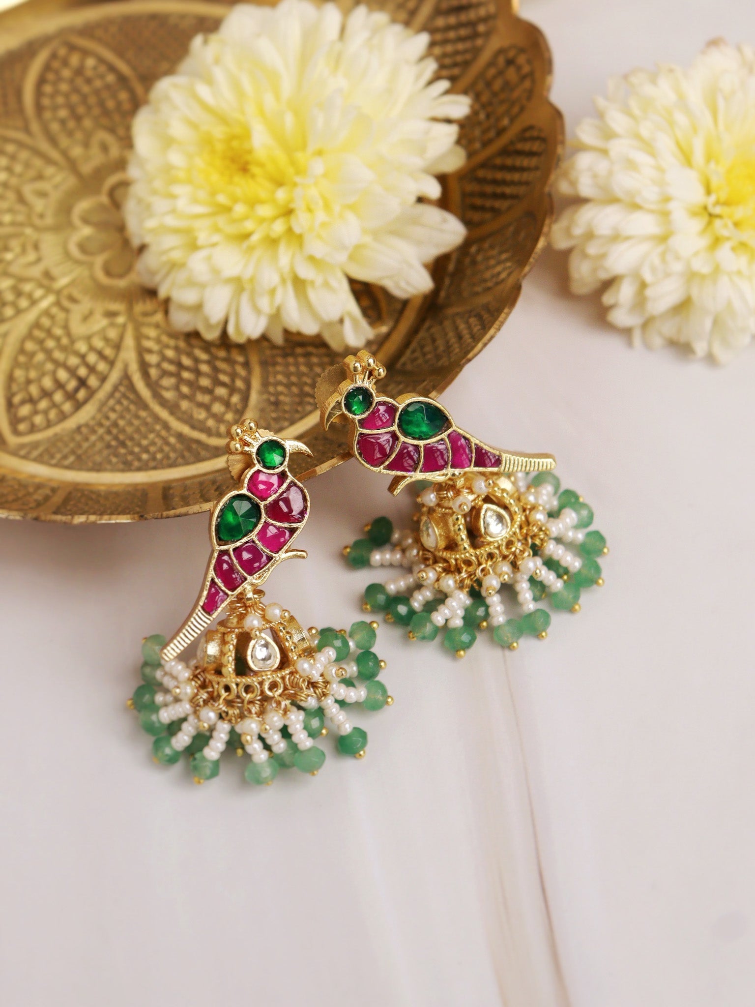  Pink Peacock Elegance: Gold-Toned Jhumkas with Green Kundan Drops
