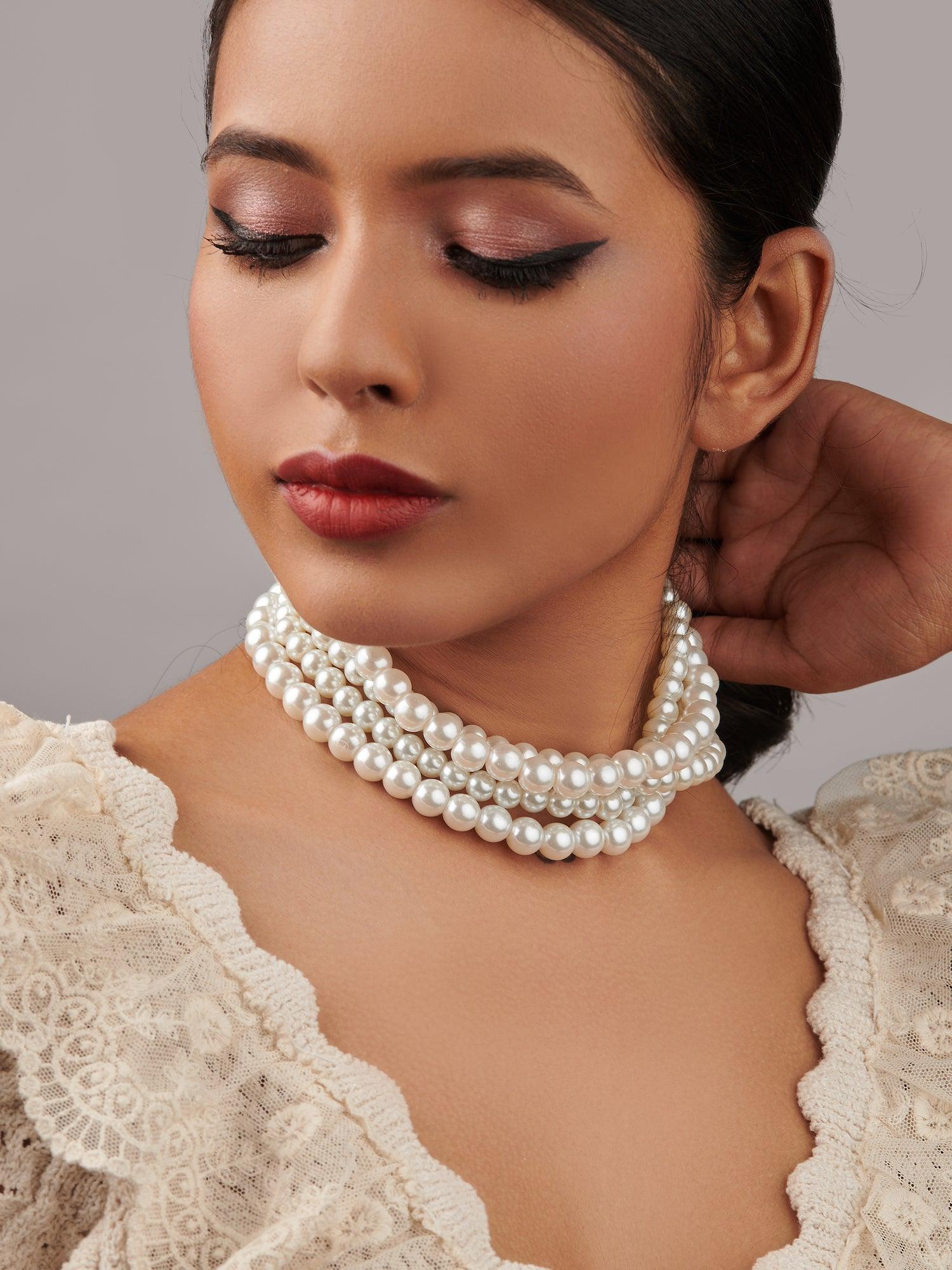  The Pearl Story - Ivory Strings of Oyster Necklace